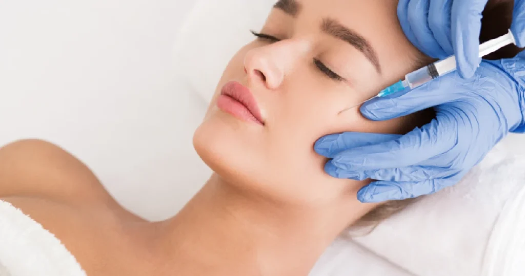 Injectable Trends for 2025: Radiesse® Skin Tightening Leads the Way 2 Woman receiving a Radiesse in Brooklyn, NY